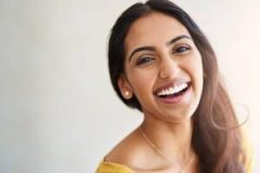 Studio portrait of an attractive and happy young woman